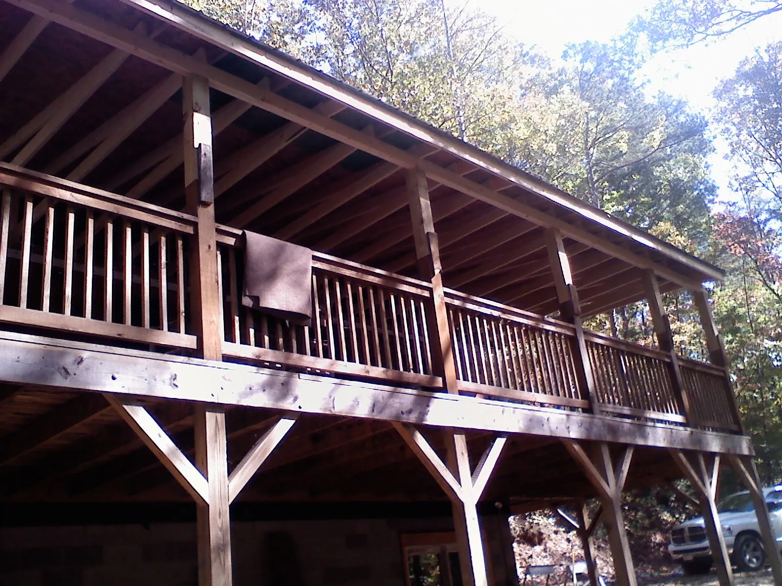 Timber framing under a new elevated porch and deck — Roof Leak Repair in Tuttle by Roofing Brothers